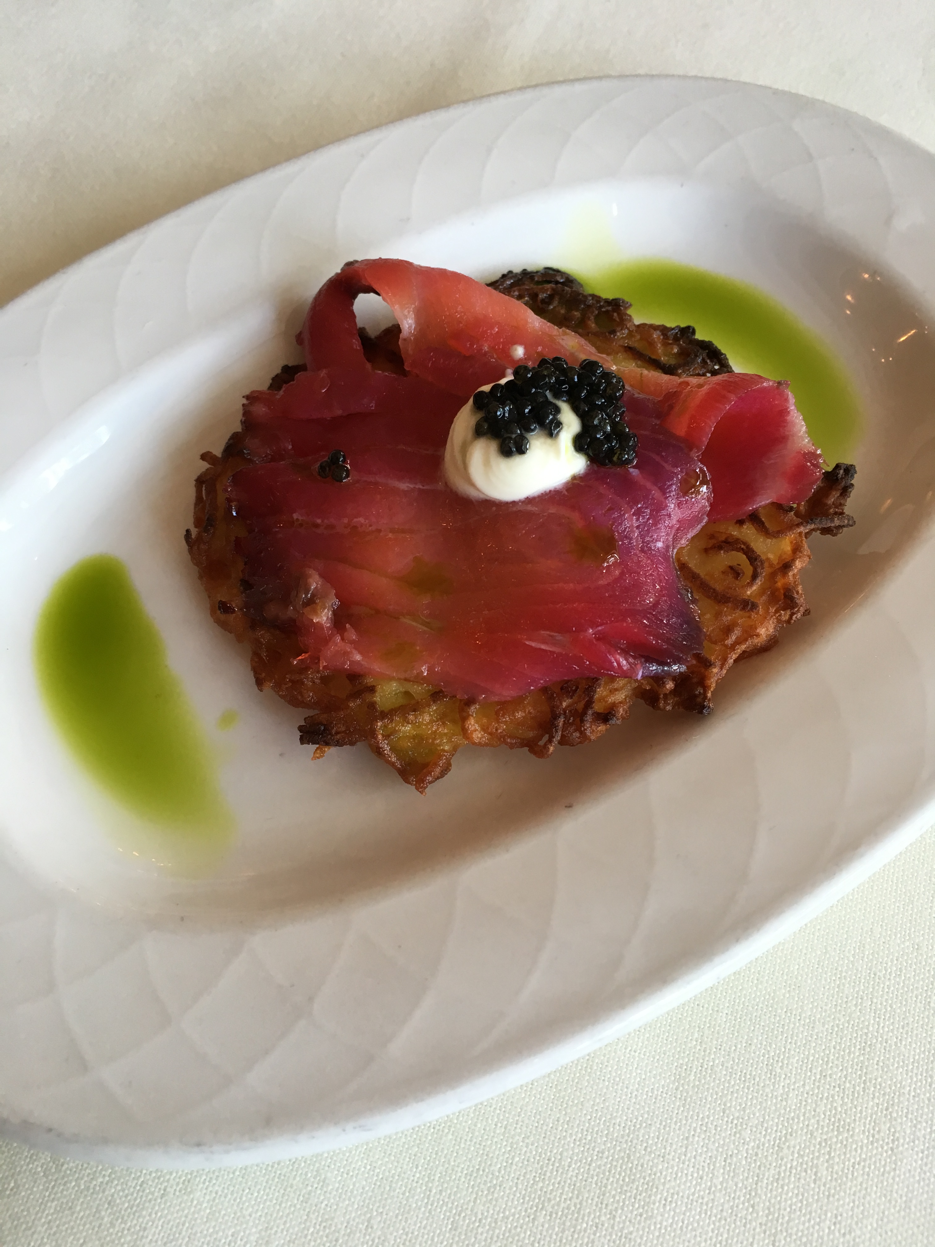 Red Beet Cured Pacific Salmon with Potato Latkes, Sour Cream and Paddlefish Caviar